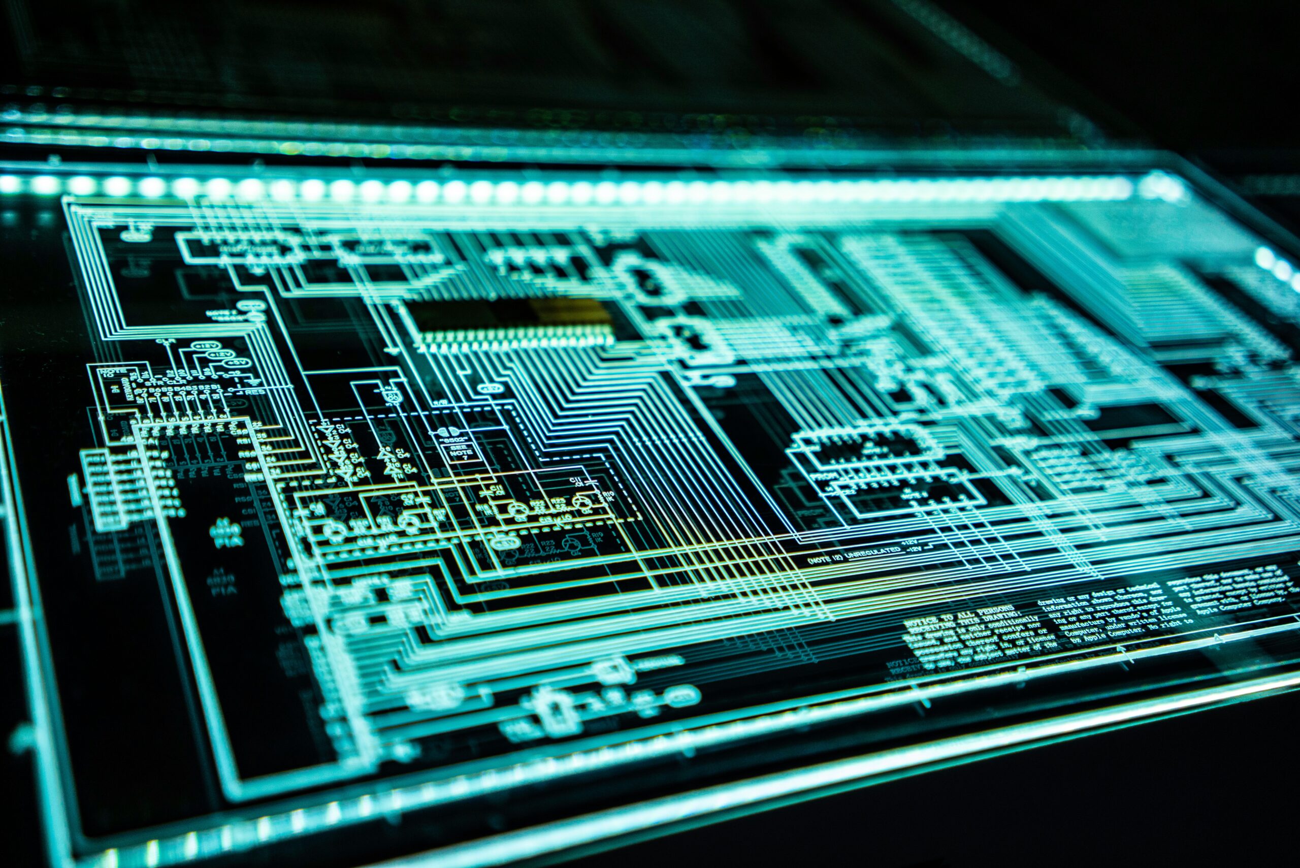 Image of a neon circuit board. Photo by Adi Goldstein on Unsplash
